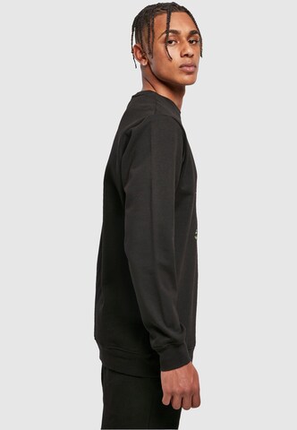 Merchcode Sweatshirt 'Peanuts Umbrellas V2' in Zwart