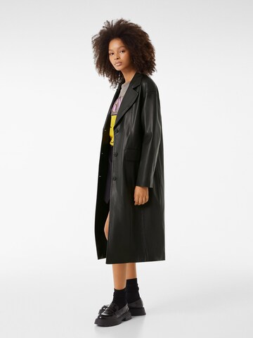 Bershka Between-seasons coat in Black: front