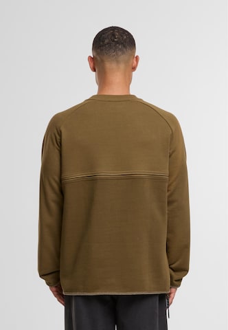 Unfair Athletics Sweatshirt in Green