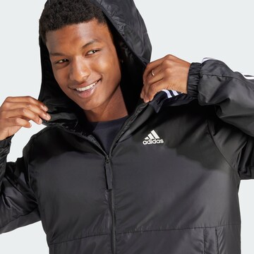 ADIDAS SPORTSWEAR - Chaqueta de montaña 'Essentials' en negro