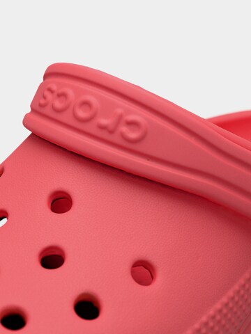 Crocs - Zapatos abiertos 'Classic' en naranja