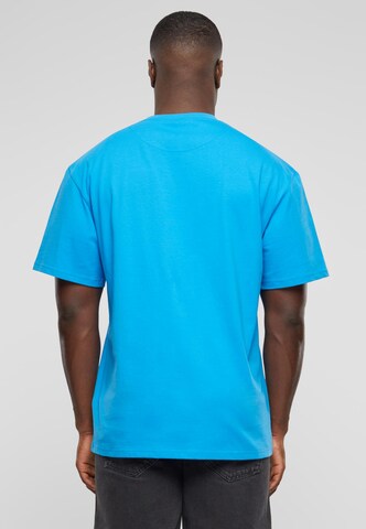 Karl Kani Shirt 'Splash Retro Tee' in Blauw