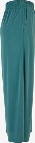 Wide leg Pantaloni di Urban Classics in verde