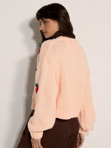 Cardigan Apricot en orange