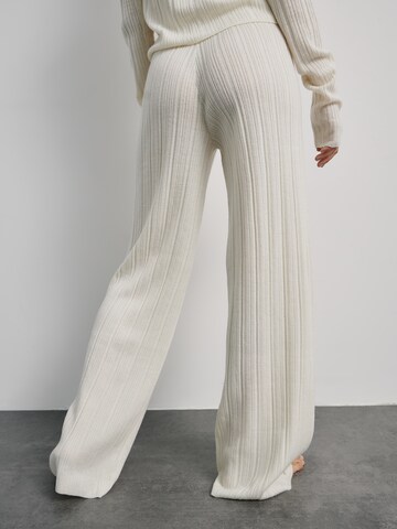 ABOUT YOU x Marie von Behrens Wide leg Trousers 'Paige' in White