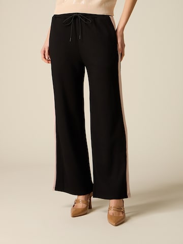 oltre Baggy Trousers in Black