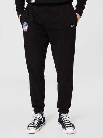 NEW ERA Tapered Pants in Black: front