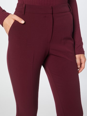 Regular Pantalon à plis 'Grazer' Warehouse en rouge