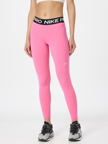 Skinny Pantalon de sport NIKE en rose : devant