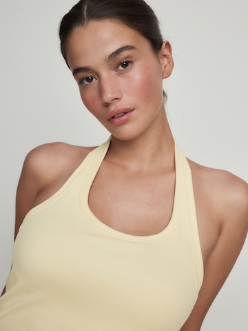 Next - Top en amarillo
