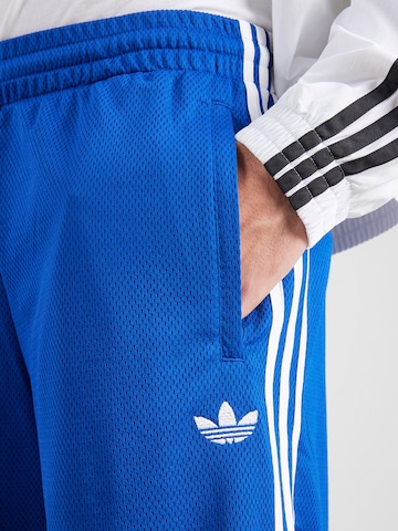 ADIDAS ORIGINALS Широка кройка Панталон в синьо