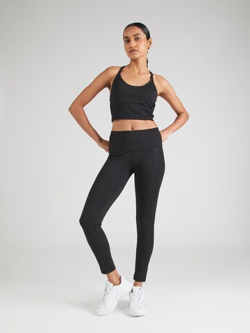 Champion Authentic Athletic Apparel Skinny Sporthose in Schwarz