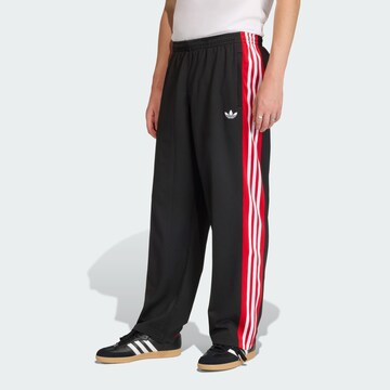 ADIDAS ORIGINALS - Loosefit Pantalón en negro: frente