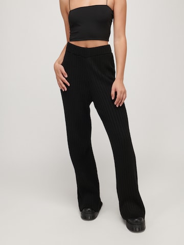 UNFOLLOWED x ABOUT YOU Flared Pants 'COMFY' in Black: front