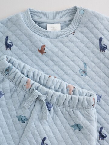 Set Next en bleu