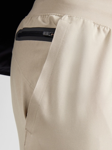 regular Pantaloni sportivi 'Unstoppable' di UNDER ARMOUR in verde