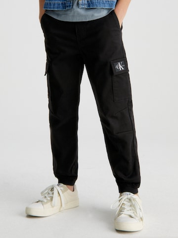 Calvin Klein Jeans Tapered Pants in Black: front