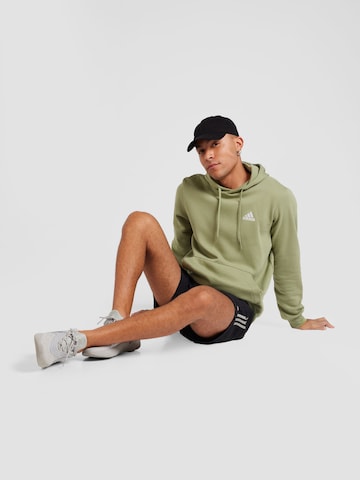 ADIDAS SPORTSWEAR Sports sweatshirt 'FEELCOZY' in Green