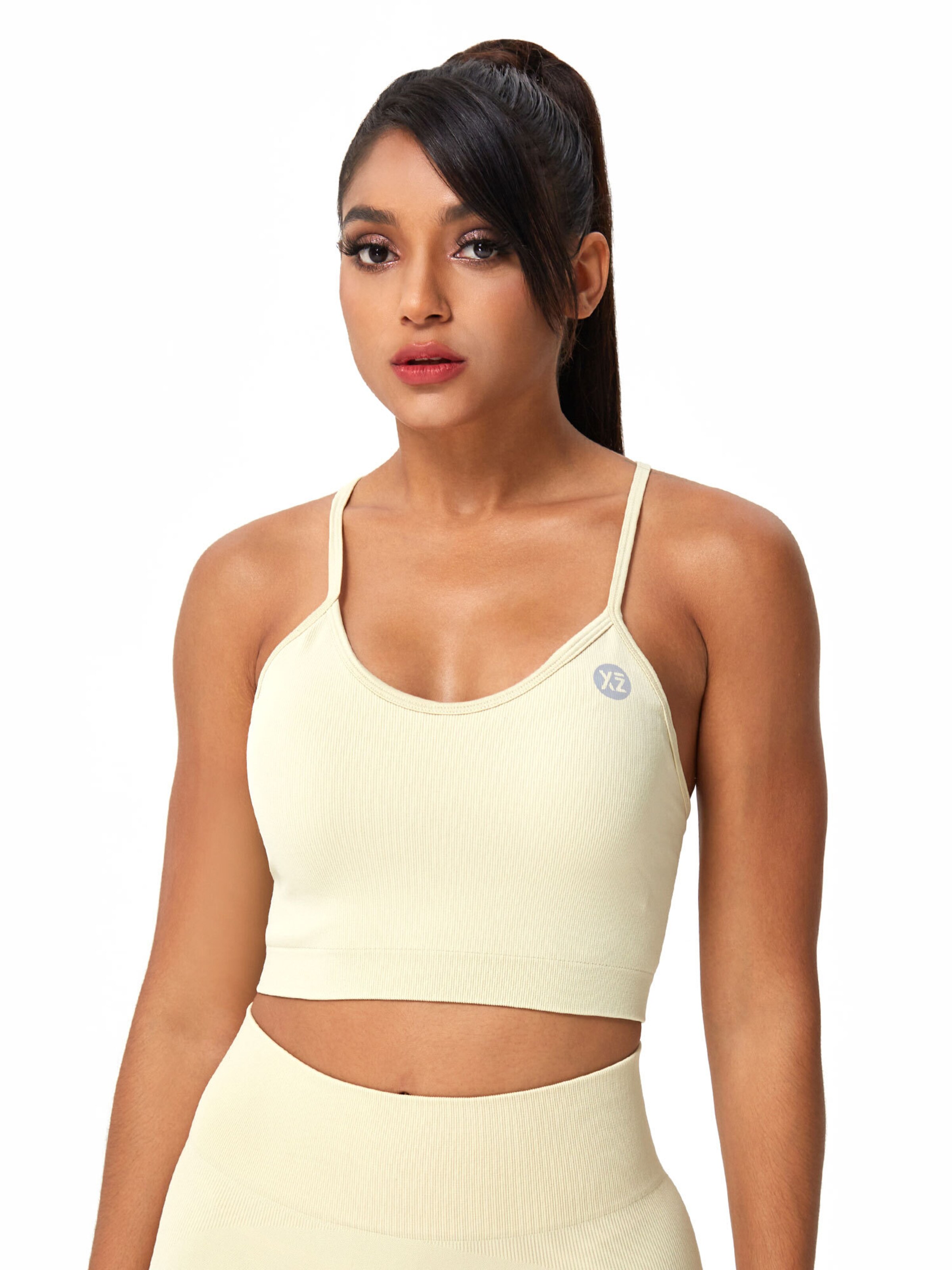 Top sportivo 'Charm' di YEAZ in beige: frontale