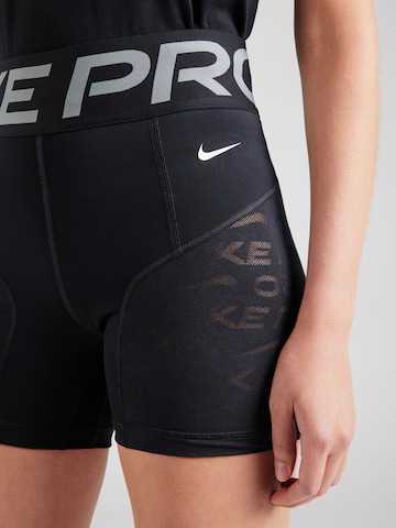 NIKE Regularen Športne hlače | črna barva