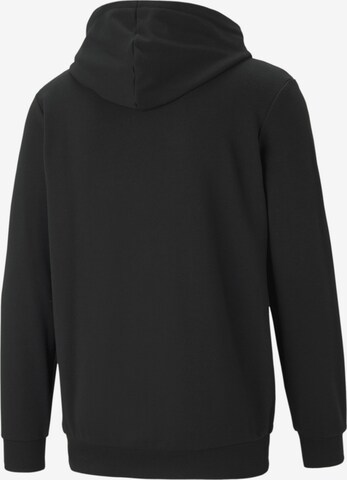 PUMA - Sudadera con cremallera deportiva 'Essentials' en negro