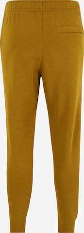 Effilé Pantalon Nike Sportswear en jaune