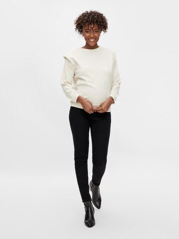 Skinny Jeggings di MAMALICIOUS in nero