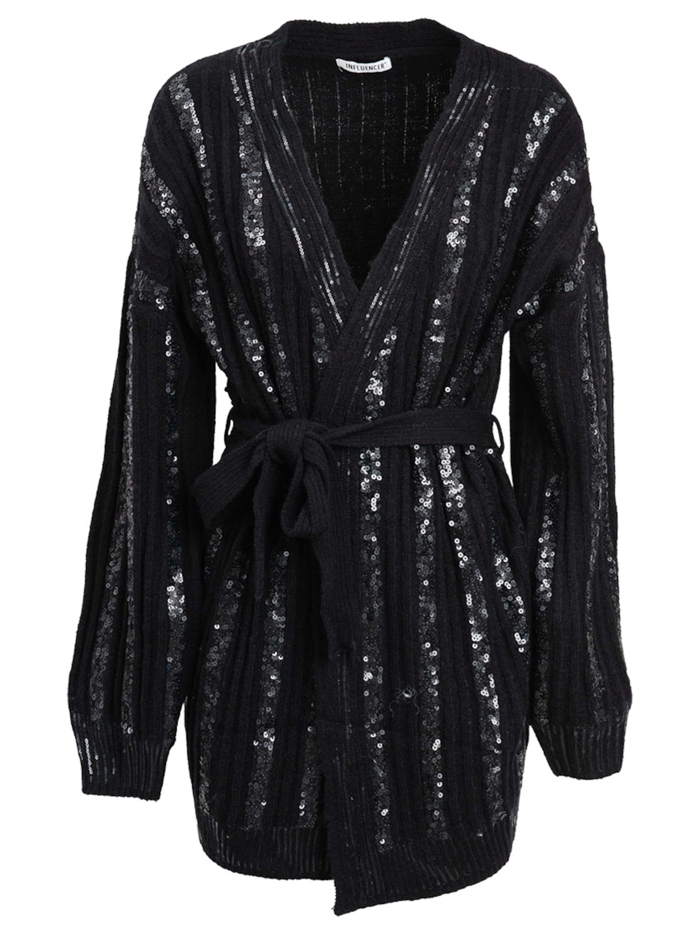 Influencer Πλεκτή ζακέτα σε μαύρο: μπροστά