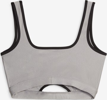 PUMA Sporttop 'DARE TO' in Grau