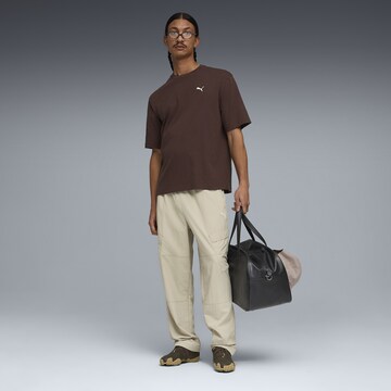 PUMA Shirt 'Wardrobe Ess' in Bruin