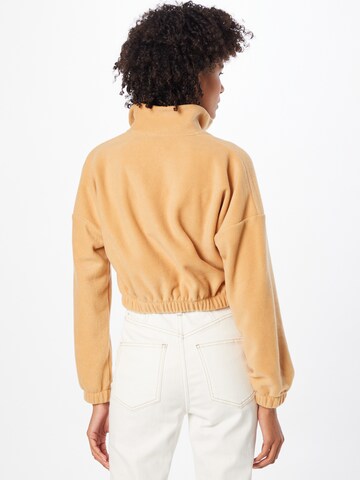 ABOUT YOU Sweatshirt 'Tania' in Beige