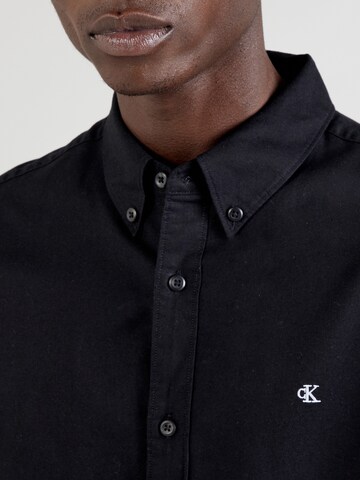 Calvin Klein Jeans Средняя посадка Рубашка 'CLASSIC' в Черный