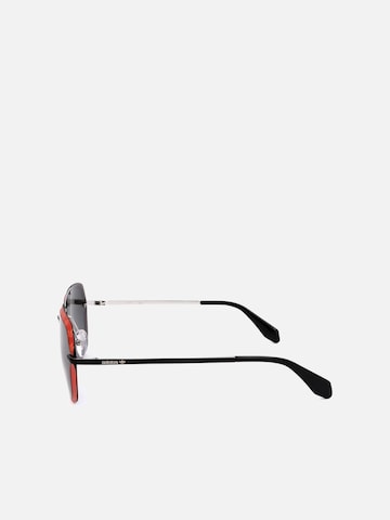 ADIDAS ORIGINALS Sonnenbrille‌‌‌ in Rot
