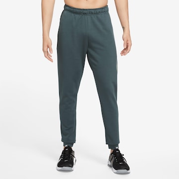 NIKE Tapered Sportbroek 'Dry Taper' in Groen: voorkant