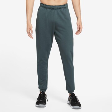 NIKE Tapered Workout Pants 'Dry Taper' in Green: front