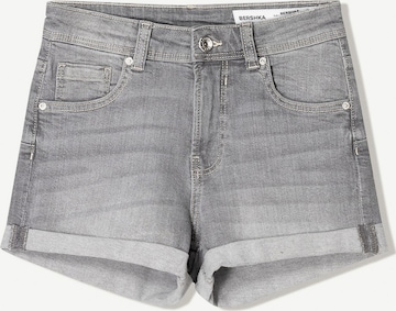 Jeans de la Bershka pe gri: față
