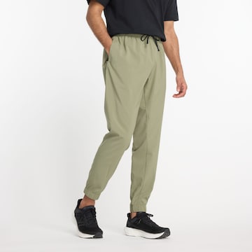 Pantalon de sport new balance en vert : devant