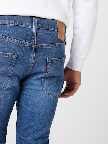 LEVI'S ® Tapered Jeans '512 Slim Taper' i blå