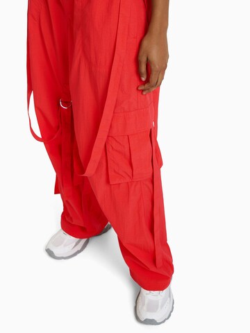 Bershka Loose fit Cargo Pants in Red