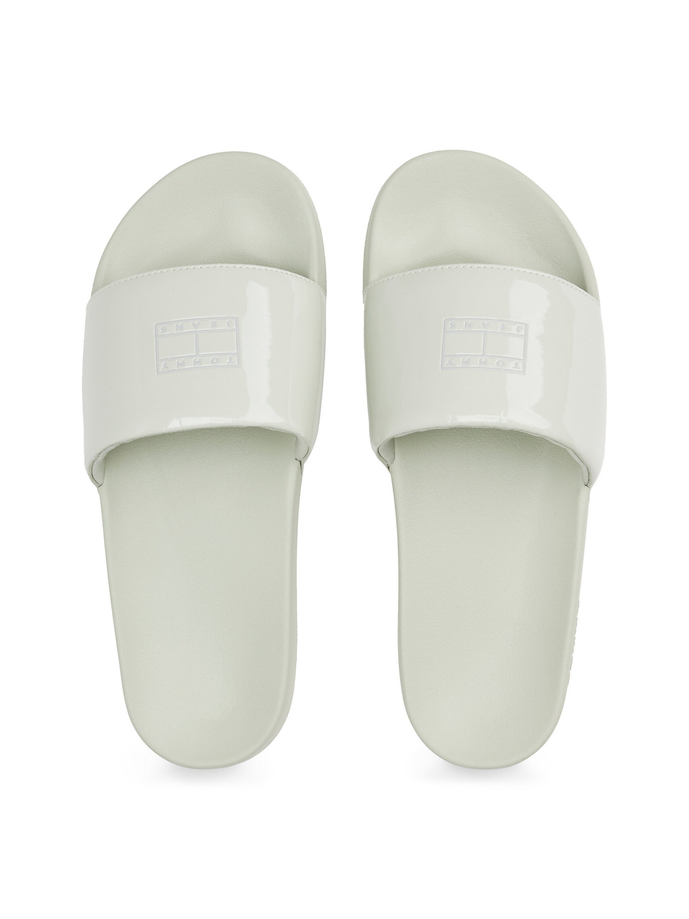 Claquettes / Tongs Tommy Jeans en blanc