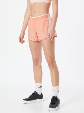 NIKE - regular Pantalón deportivo en naranja: frente