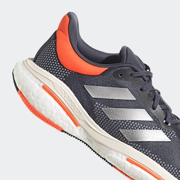 ADIDAS SPORTSWEAR Matalavartiset tennarit 'Solarglide 5' värissä sininen