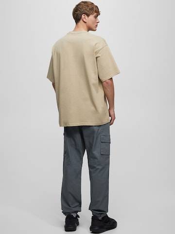Pull&Bear Ozke Kargo hlače | siva barva