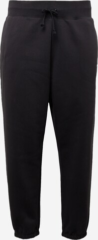 Tapered Pantaloni sportivi 'Phoenix' di Nike Sportswear in nero: frontale