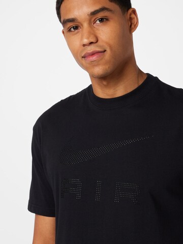 Nike Sportswear - Camisa em preto