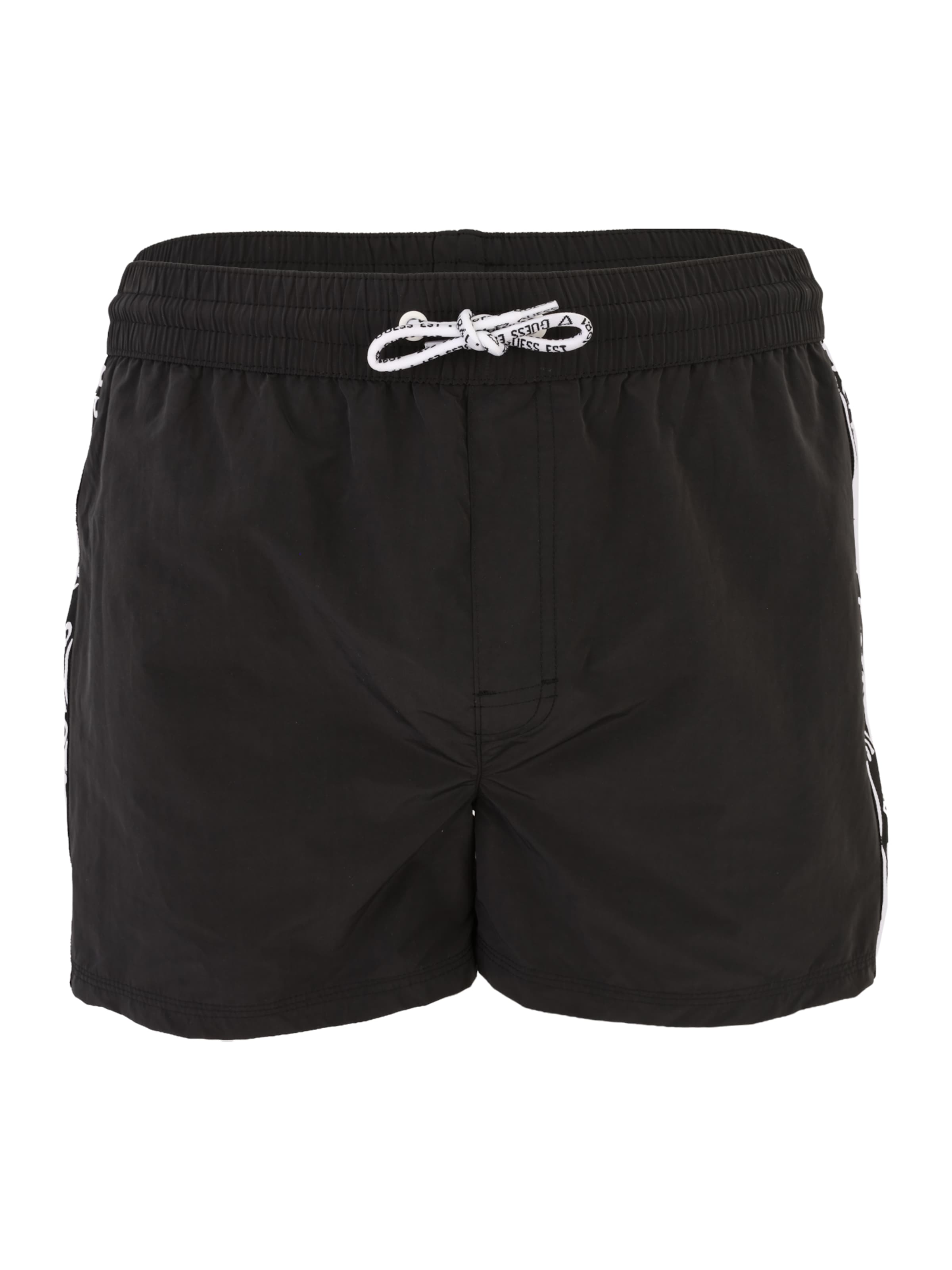 GUESS Shorts de bain en noir / blanc, Vue avec produit