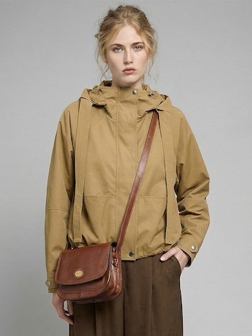 The Bridge Crossbody bag in Pink: front