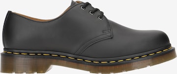 Chaussure à lacets Dr. Martens en noir : devant