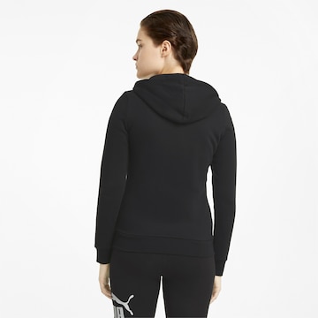 PUMA - Sudadera con cremallera deportiva 'Essential' en negro