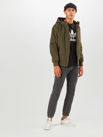 Carhartt WIP Regular fit Tussenjas 'Sail' in Groen